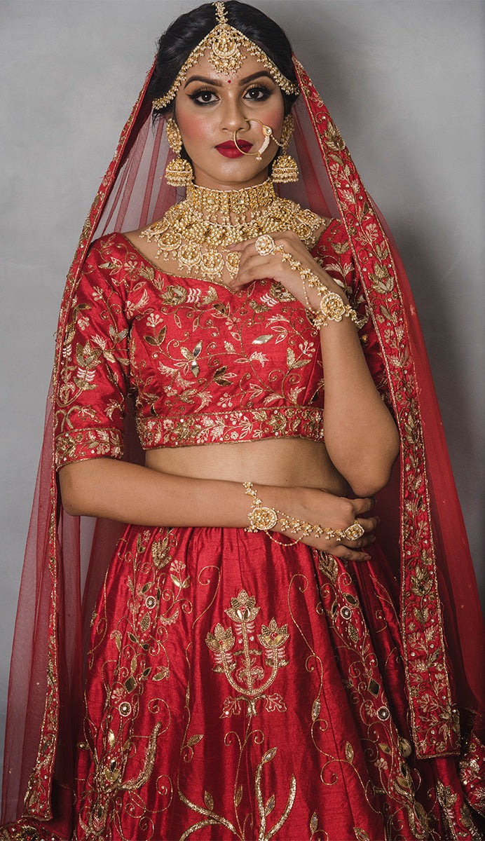 Red Raw Silk Leather and Aari work paradise lehenga