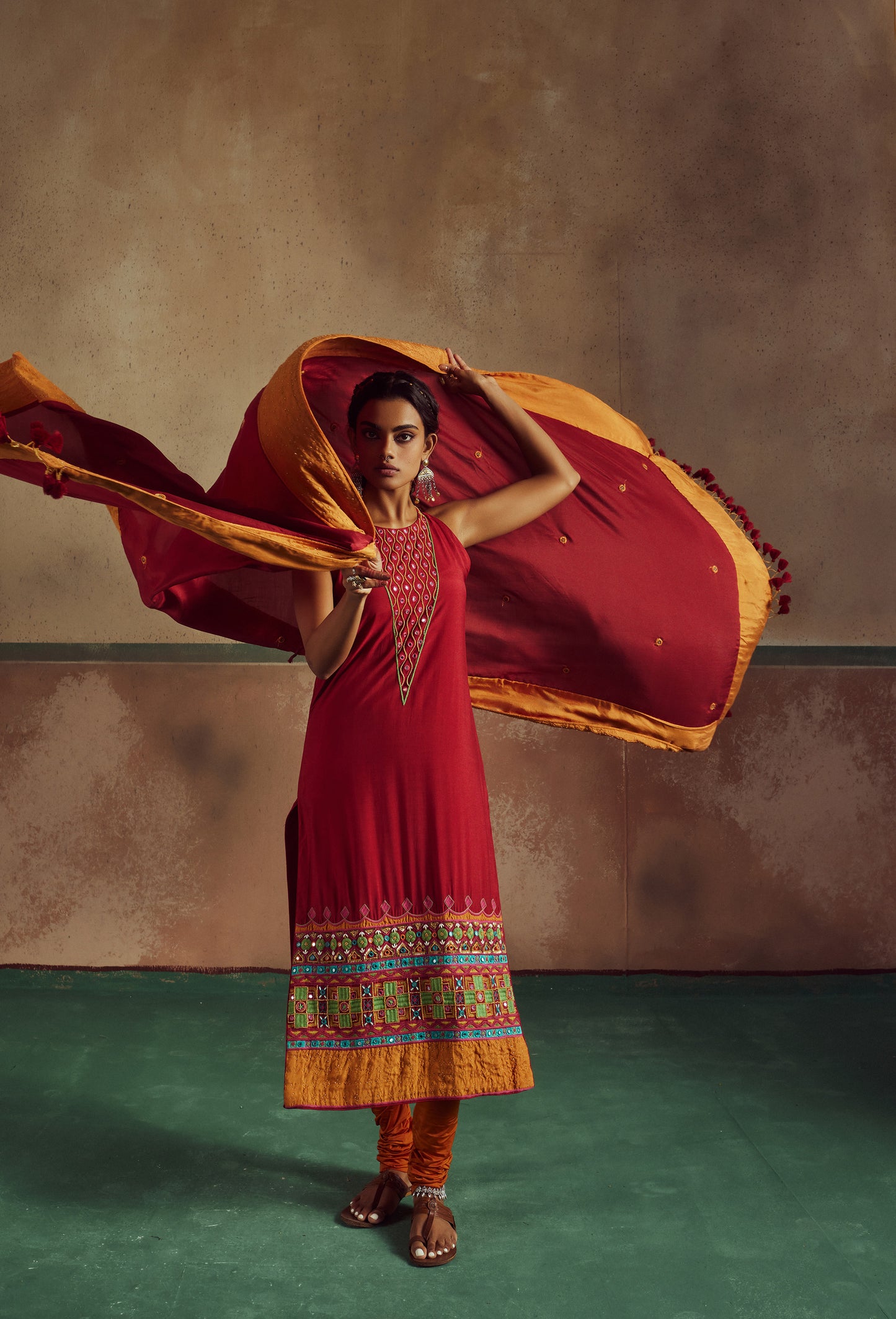 red embroidered kurta set with churidaar Rang