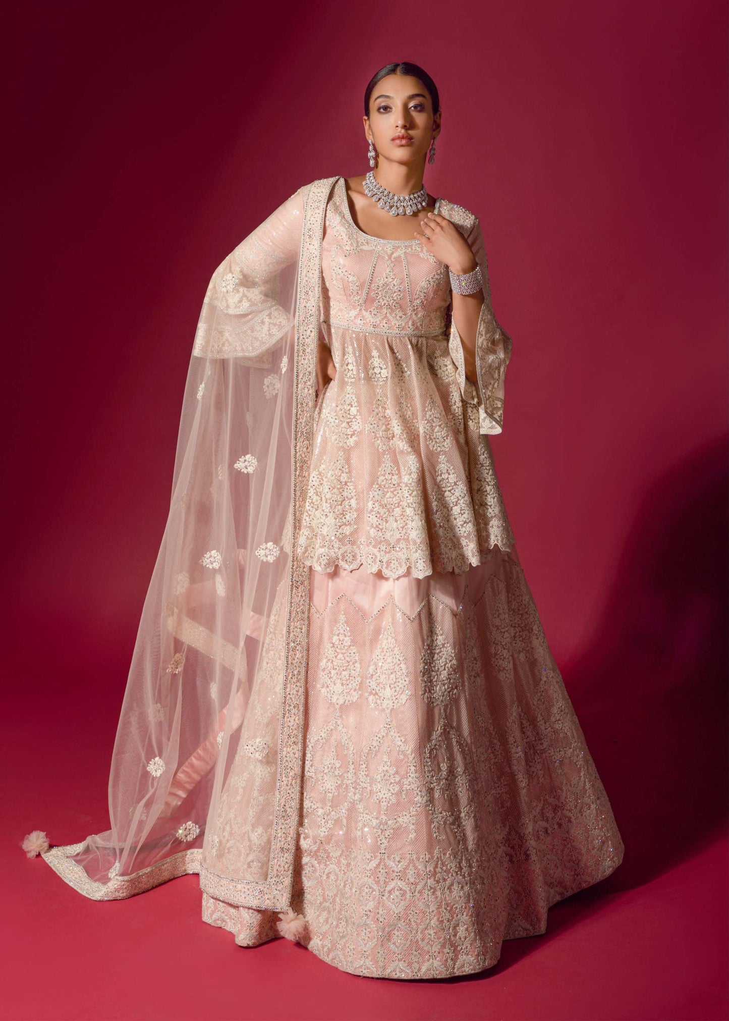 Beautiful Baby Pink Peplum Jacket Velvet Lehenga Set