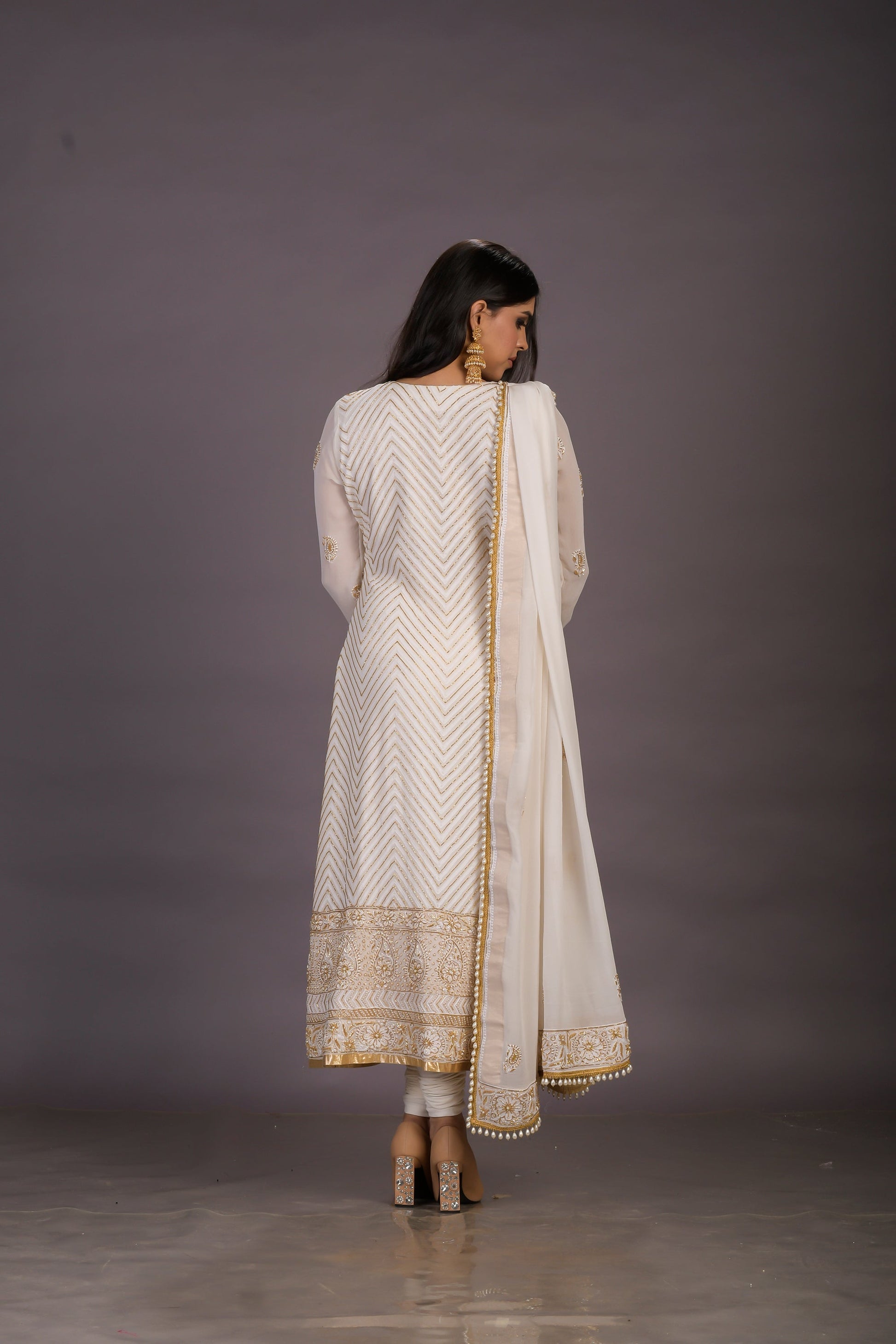 A Classic Cream Chikankari Suit With Gold And Pearl Embellishments