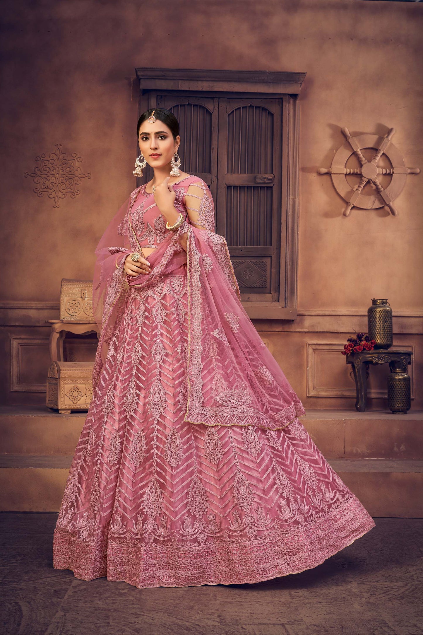 Dusty Pink Color Embroidered Net Lehenga