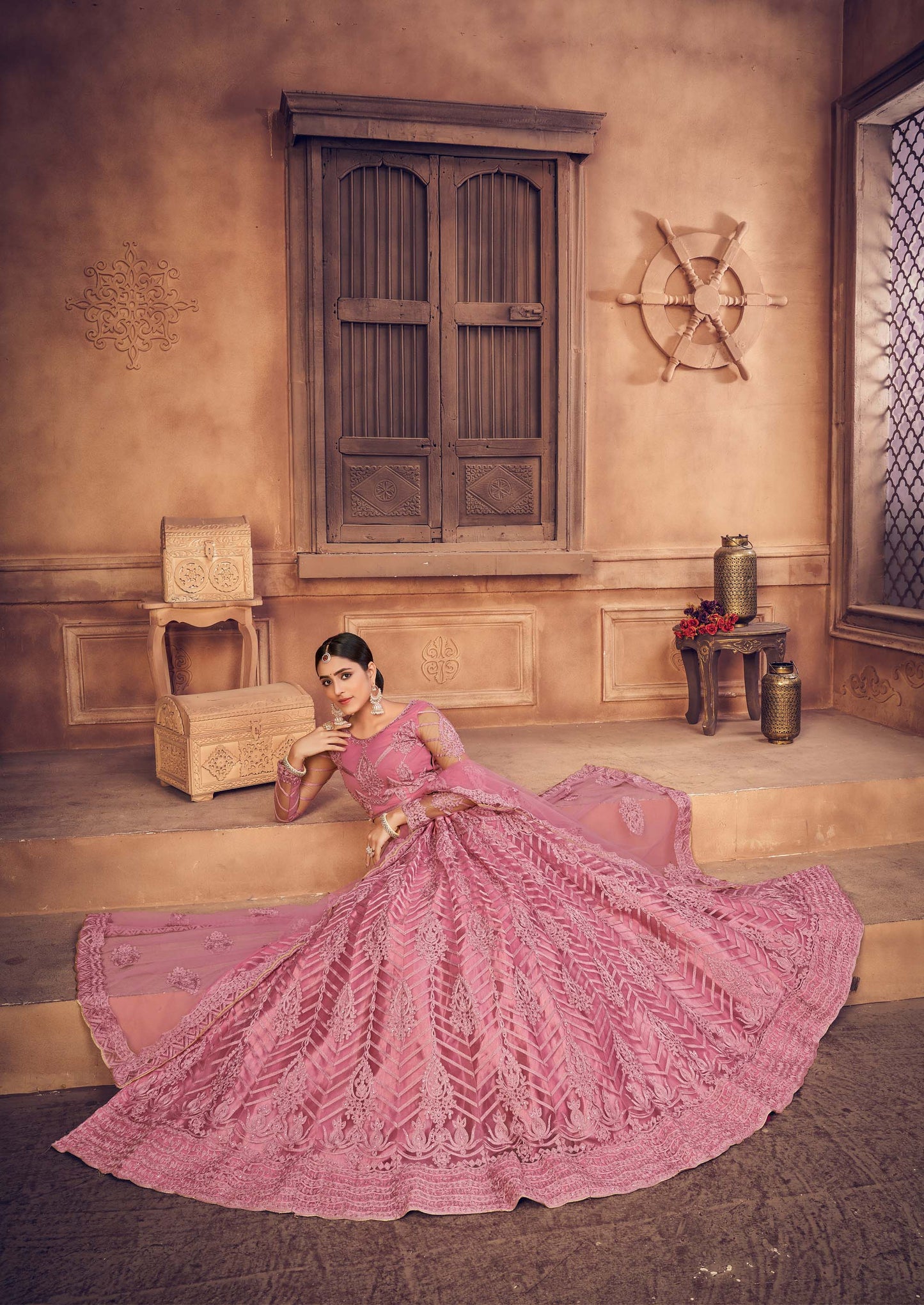 Dusty Pink Color Embroidered Net Lehenga